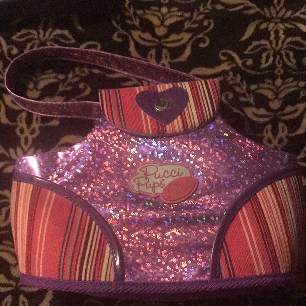 A pucci pups and friends bag